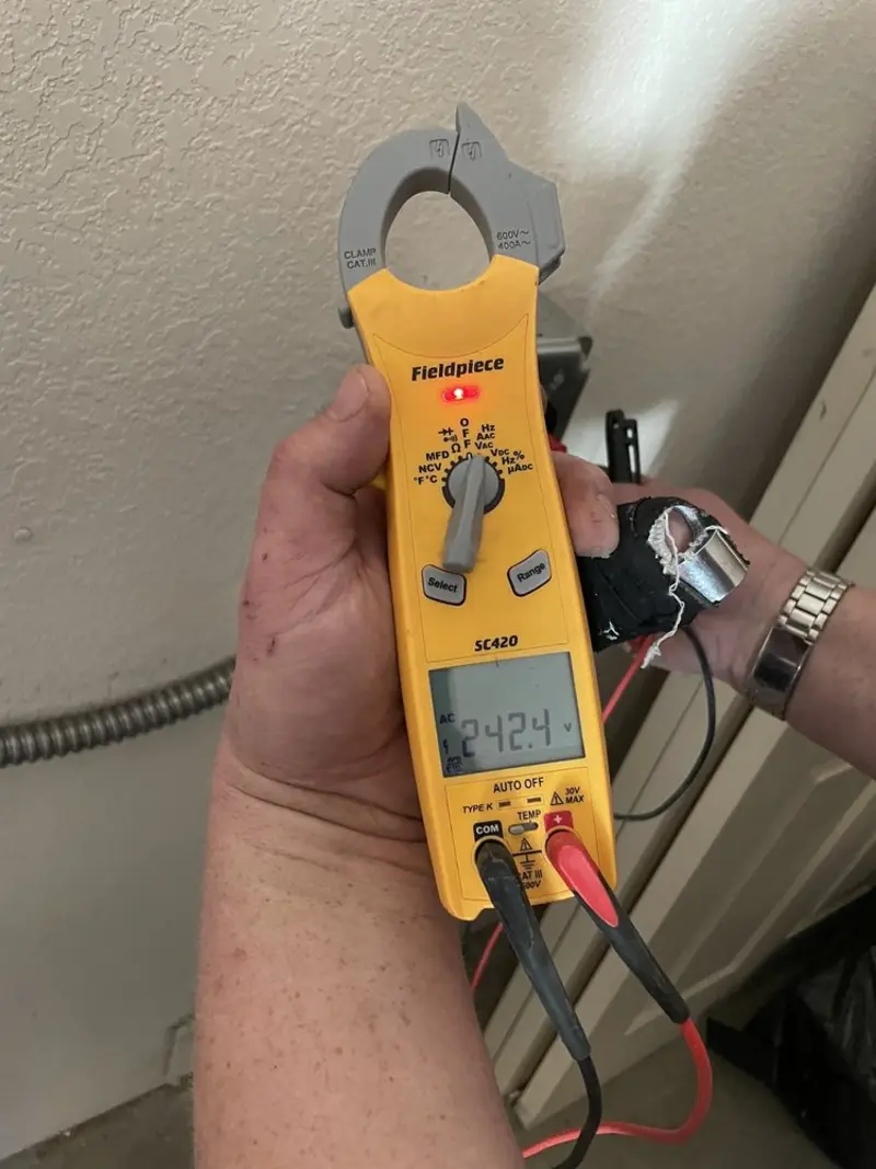 Voltage testing with clamp meter during Generator Installation in Sonoma